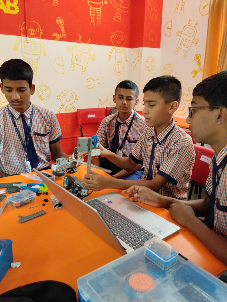 Hands-on science learning session with teachers and students